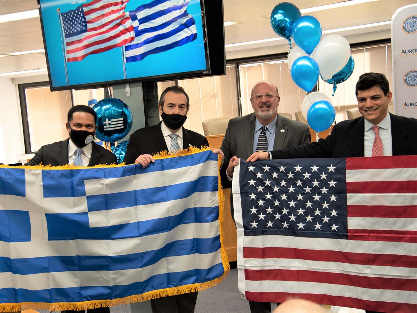 December 16th 2021 Irvin-Mesiacos Alexandrou-Koubarakis with flags